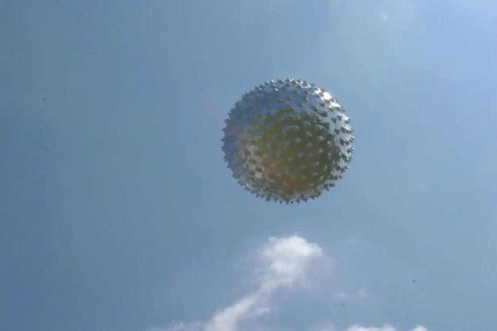 A depiction of metallic orbs reportedly observed by NASA as part of UAP (Unidentified Aerial Phenomena) studies
