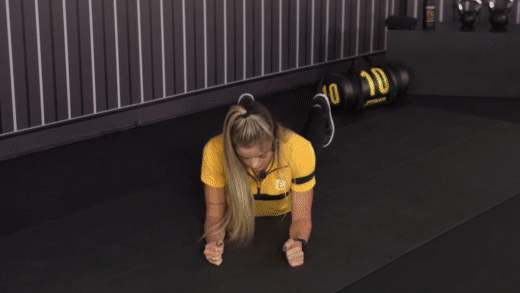 Woman performing planks exercise for core strength