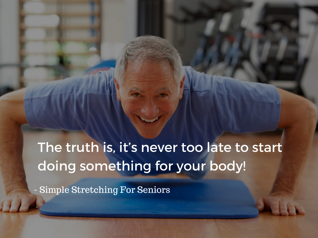 Senior man performing push-ups in a state-of-the-art gym, showcasing strength and vitality in old age
